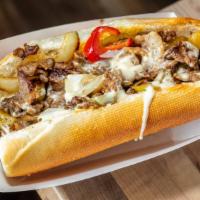 Warrior Cheesesteak · Grilled steak or chicken, grilled onions, bell pepper, cherry peppers, white cheese sauce, a...