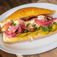 Cubano Cheesesteak · Carnitas pork, smoked ham, mayo, mustard, pickles, white cheese sauce, pickled red onions, a...