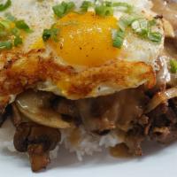 LOCO MOCO · Thin sliced grilled steak, grilled onions, mushrooms, adobo gravy over rice and 2 sunny eggs