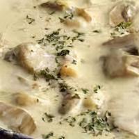 Clam Chowder · Homemade fresh in house served with bacon and parsley garnish.