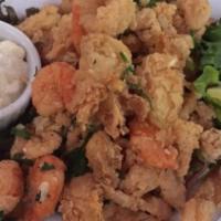 Frittura Mista · Fresh Monterey calamari, wild prawns, artichokes, lightly fried, with capers, wine vinegar a...