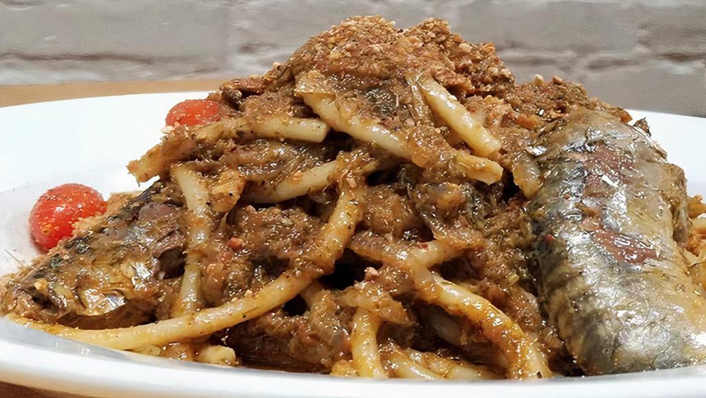 Bucatini 'chi Finucchiede' · Palermo specialty, fresh sardines, pine nuts, currants, sweet onion, Sicilian anchovies, saffron, fennel, toasted bread crumbs, bucatini