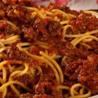 Spaghetti With Meat Sauce · savory homemade meat sauce with 100% premium ground beef served on a bed of spaghetti
