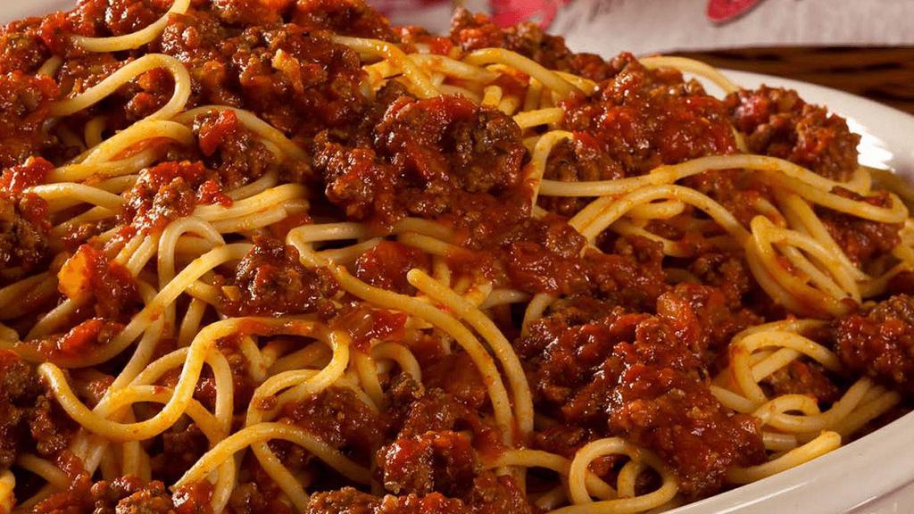 Spaghetti With Meat Sauce · Savory homemade meat sauce with 100% premium ground beef served on a bed of spaghetti