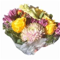 Roman Canary Fresh Cut Bouquet · Multiple yellow roses, chrysanthemums, with tuberose and green filler in a medium sized bouq...