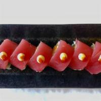 Red Dragon Fly Roll · Spicy tuna, avocado, cream cheese, topped with tuna, spicy mayo, hot sauce.