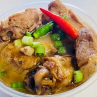 Chicken and Pork Adobo (16Oz) · Filipino style chicken and Pork stew