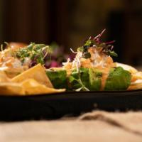 Lucy's Grilled Avocado.. · stuffed with shrimp salad and topped with chipotle aioli. served  house made tortilla chips