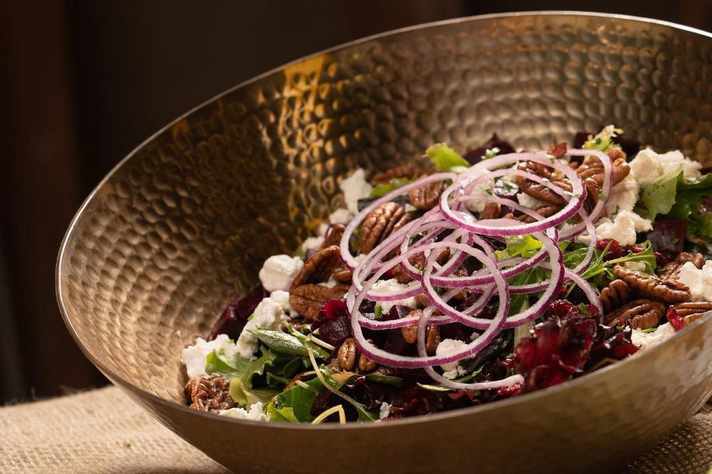 Greens & Goats... · mixed greens, beets, red onions, dried cranberries, candied pecans, and goat cheese tossed in a housemade raspberry vinaigrette. *gluten free*