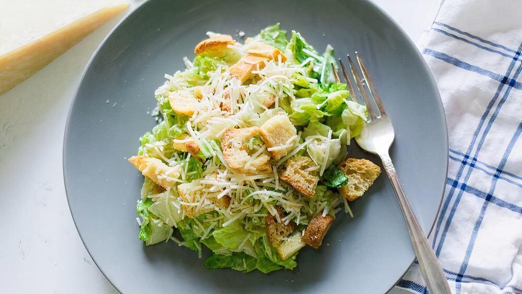 Side Salad - Caesar. · housemade caesar dressing, parmesan cheese, and croutons. *contains fish*
