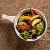 Sauteed Vegetables. · Squash, carrots, and broccoli sauteed in garlic butter . *Vegetarian
