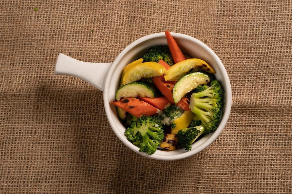 Sauteed Vegetables. · Squash, carrots, and broccoli sauteed in garlic butter . *Vegetarian