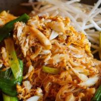 Chan Pad Poo · Pan-fried rice stick noodles, egg and real crab meat with special house sauce serve with sca...