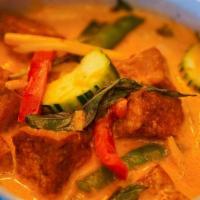 Gang-Dang · Red curry paste with your choice of protein* cooked in coconut milk with bamboo shoots, zucc...