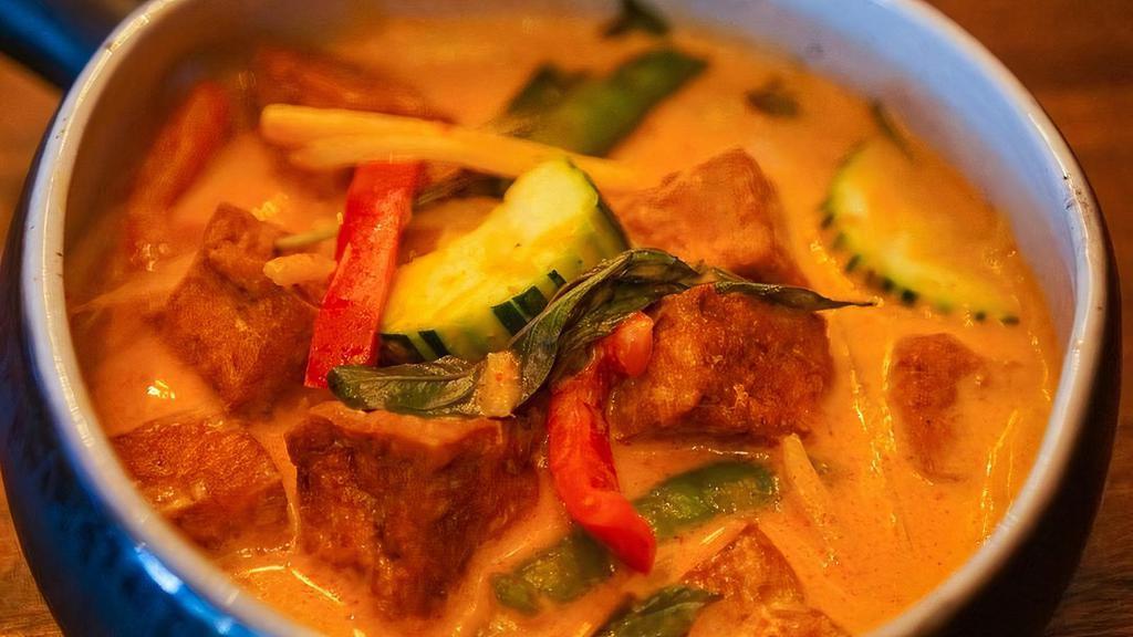 Gang-Dang · Red curry paste with your choice of protein* cooked in coconut milk with bamboo shoots, zucchini, bell pepper, snap pea, and basil. (Gluten-Free)