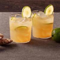Ginger Honey Limeade · Homemade ginger and lime drink sweetened with honey and cane sugar. Has a kick!