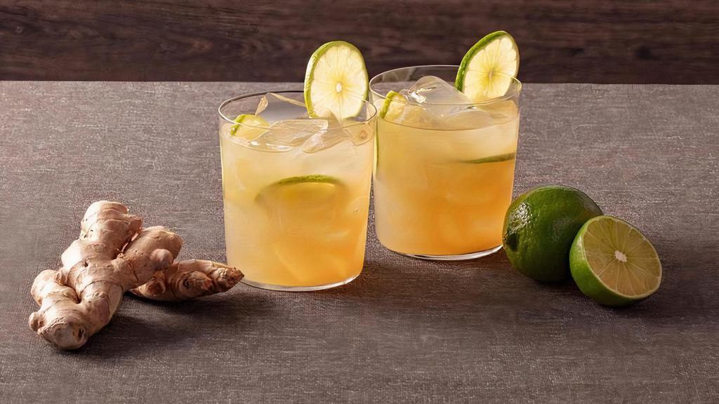 Ginger Honey Limeade · Homemade ginger and lime drink sweetened with honey and cane sugar. Has a kick!