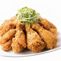 Crispy Padak Chicken (Half) · Crispy fried chicken coated with sweet and mustardy green onion sauce, topped with shredded ...