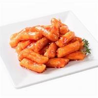 Rice Cake · Fried rice cakes sauced in classic Korean sweet and spicy sauce.