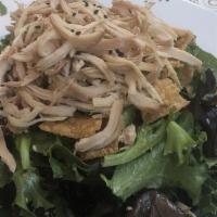 Signature Chinese Chicken Salad · Organic mixed greens, house made sesame vinaigrette, fried wonton wrapper, green onions, toa...