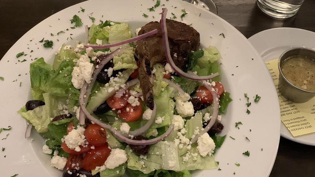 Greek Salad with Lamb · Little gem organic chopped romaine, kalamata olives, cherry tomatoes, cucumber, red onions, Feta cheese, grilled double lamb chop.