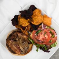 The Shelby · Grilled quarter pounder beef patty, caramelized onions, bacon, tomato, mesclun mix, mayonnai...