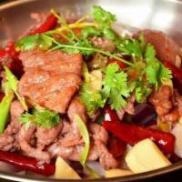 3. Griddle Cooked Sliced Beef with Pepper 干锅牛肉 · Spicy.