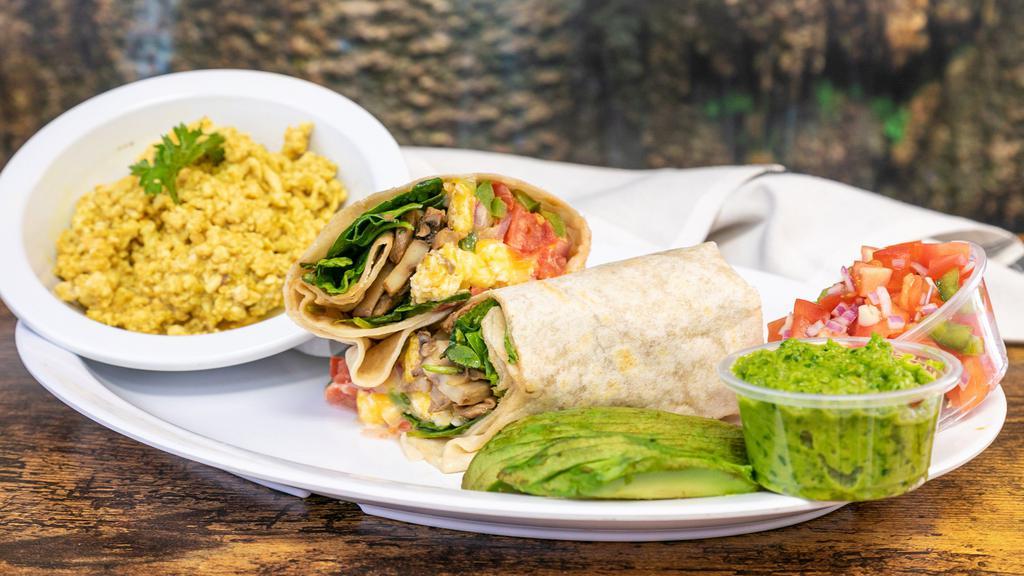 Ground Breaking Chicken Breakfast Burrito · Ground chicken, eggs, onions, tomatoes, bell peppers, beans and cheese wrapped in a flour tortilla.