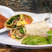 I Chorizo You Breakfast Burrito · Chorizo, eggs, spicy jalapeños, hot sauce, cheddar cheese, onions, tomatoes wrapped in a flo...