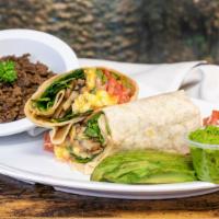 Ground Breaking Beef Breakfast Burrito · Ground beef, onions, tomatoes, bell peppers in flour tortilla with eggs, beans, and cheese.