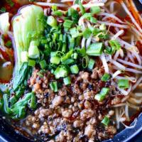 Dan Dan Noodle Soup · Asian noodles with minced pork, preserved vegetables, bean sprout, Bok Choy, and scallion in...