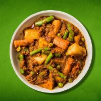 Heavenly Mixed Veggies  · Seasoned vegetables mild, medium, or spicy in onion, tomato based sauce cooked at low heat, ...