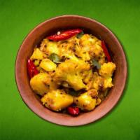 Savory Potato & Cauliflower · Cauliflower and potatoes cooked to perfection with mild Indian spices along with ginger, tom...