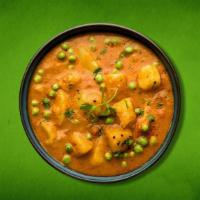 Just Potato & Peas  · Peas and potatoes, simmered to perfection in an onion, tomato and Indian whole spice curry.