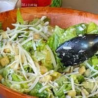 Caesar Salad · Serves three or four. Romaine lettuce, croutons, parmesan cheese and caesar dressing.