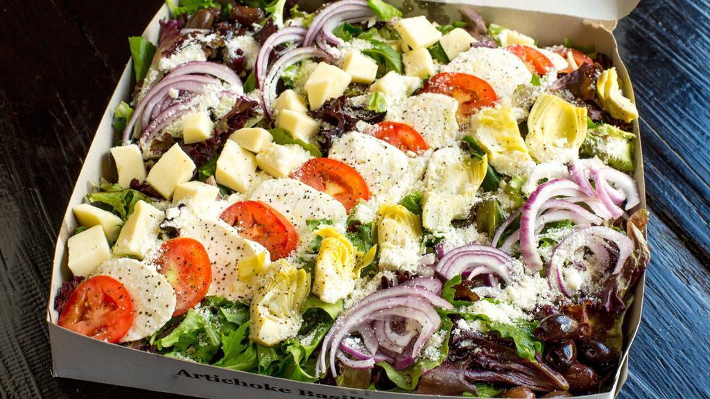 Box Salad · Serves three or four. Spring mix, artichoke hearts, red onion, kalamata olives, plum tomatoes, mozzarella and house dressing.