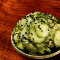 Cucumber Salad · Gluten free. Thinly sliced Japanese cucumbers marinated in vinaigrette dressing.