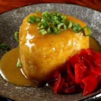 Curry Rice Ball · Rice topped with a rich curry sauce.