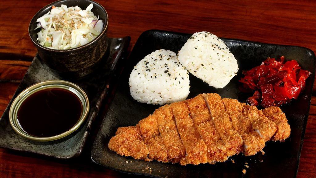 Chicken Katsu · Marinated chicken breast breaded with panko then deep fried. Served with steamed rice, coleslaw and curry sauce or tonkatsu sauce.