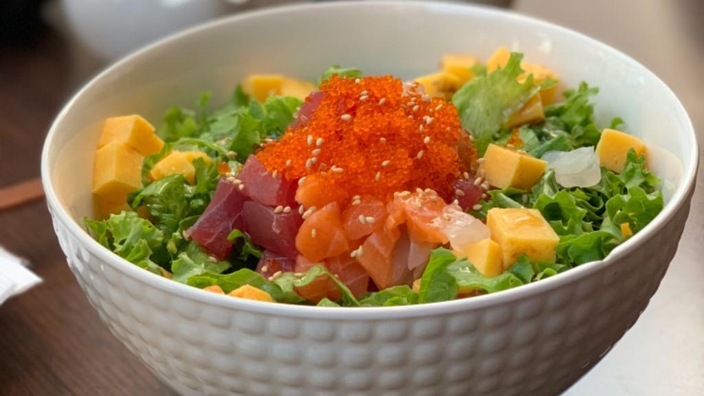 Hwe Dup Bap · Sashimi salad, lettuce, tobiko, rice, spicy sweet sauce.