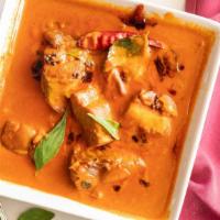 Meenachil Fish Curry · Medium spicy red curry with coconut milk.