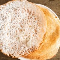 Appam · A Kerala special; Pancake made of rice batter prepared in coconut milk.