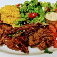 Lamb chops plate · 2 grilled Halal Lamb chops served with Hummus, Greek salad, Pickles, choice of 2 sauces, Tur...