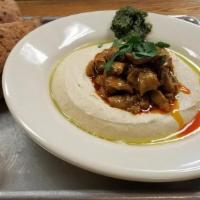 Hummus Mushrooms · Hummus topped with Mushrooms, Onions, Garlic, and spices. Served with 2 Pitas. Hummus is ser...