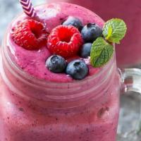 Happy Berry Smoothie · Mixed berries and Banana. No added sugar.  Non-dairy cream.