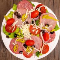 Anti-Pesto Salad · A fresh garden salad with salami, pepperoni, ham, and mozzarella cheese.