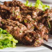 Lamb Kabab · Char grilled minced lamb with parsley, veggies and spices.