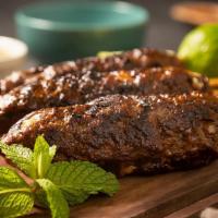 Kofta Kabab · Char grilled minced lamb and beef with parsley, veggies and spices.