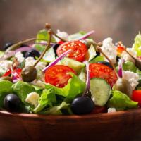 Mediterranean Salad · Romaine lettuce, tomatoes, Persian cucumber, red onions, red cabbage, Garbanzo beans with ho...