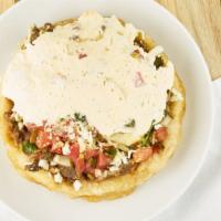 Sope · Sope - comes with lettuce tomato beans sour cream and cheese
